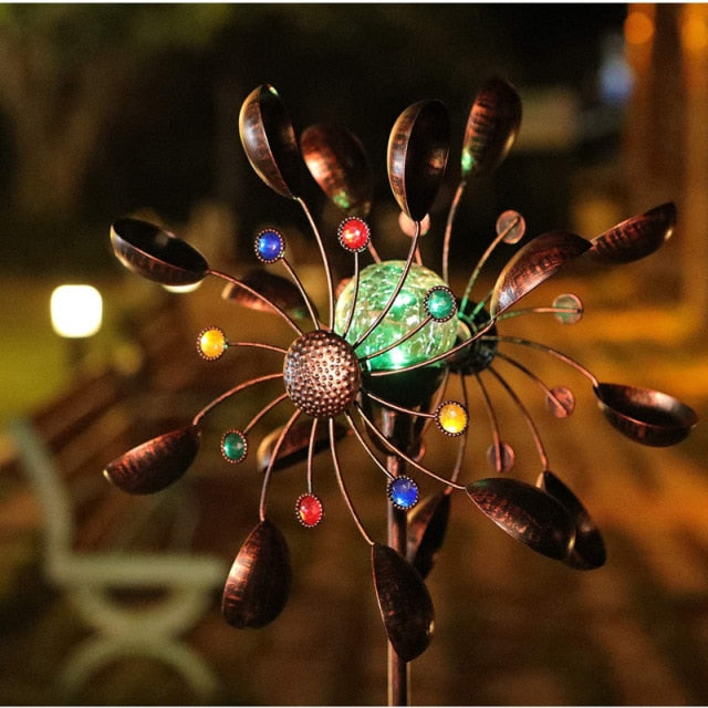 Mesmerizing Kinetic Garden Spinner Sculptures - Solutiverse